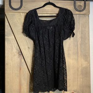 Black lace Ann Taylor loft women’s blouse. Very cute with leggings jeans etc.